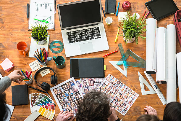 The editor at work with his team choosing the right image